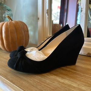 Women’s Black wedge size 7.5